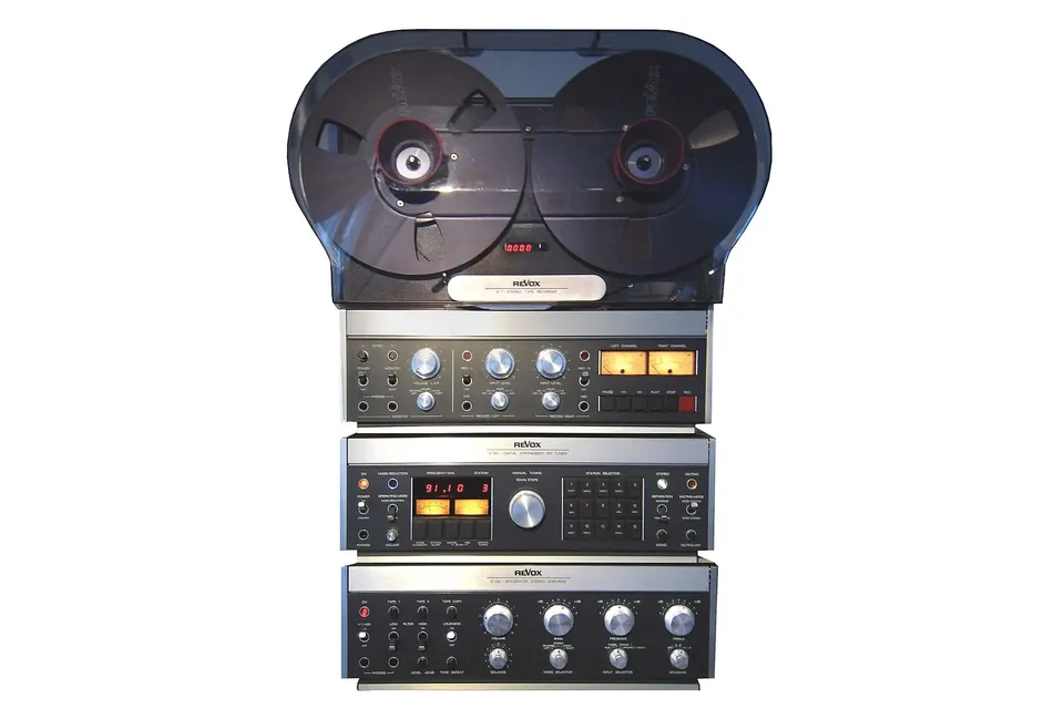 A matching Revox hi-fi system of the late 1970s: a B77 reel-to-reel recorder above a tuner and an amplifier